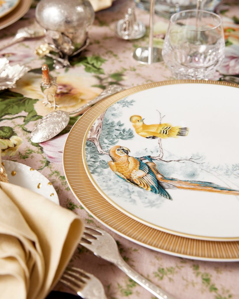 contemporary plate with beautiful decorations of parrots hand painted on