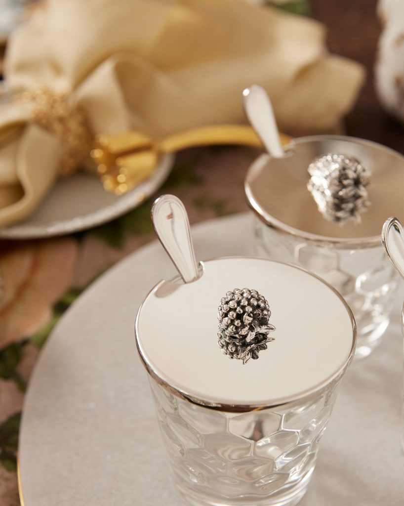 glass with sealed top and&nbsp;a spoon inside the glass